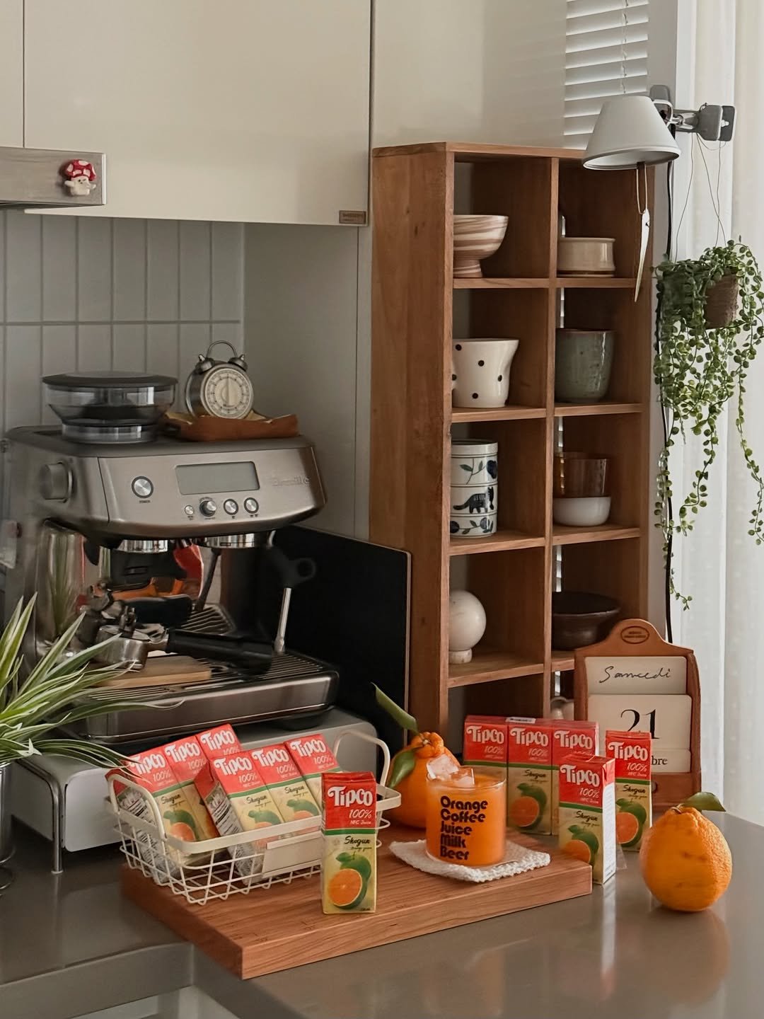 Photo shared by 소곤, 소곤테이블, 홈카페, 홈스타일링, 집꾸미기 on February 18, 2026 tagging @tipcojuice. May be an image of coffee maker, plate rack, spice rack, rack, kitchen appliance, shelf, cabinet, kitchen and text that says '4번포:의 Τρωo ΤρO 100% 30K 100% Tipco TipcO Τίραο 100 Tipco ま2 100% 100% Jagan Samcedi 1 b re Τίρου Τ Tipco Τίρω 21 Tco Τίροο 100 Coffee'.