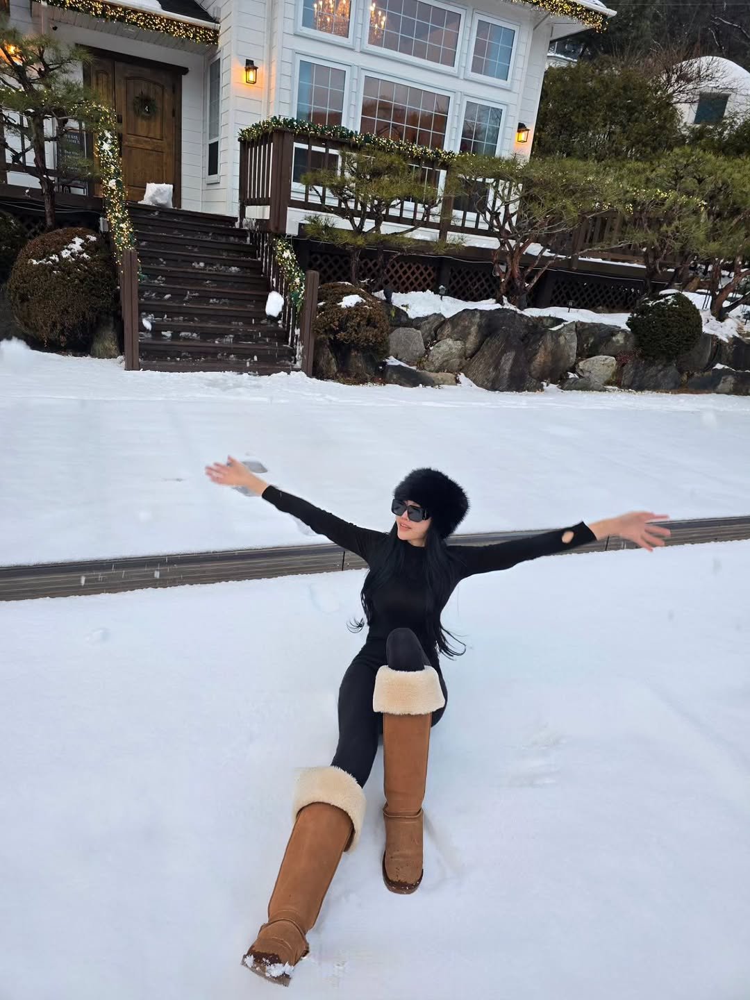 Photo shared by 안아맘 on December 25, 2025 tagging @kim_woo_joo. May be an image of standing, snow and text.