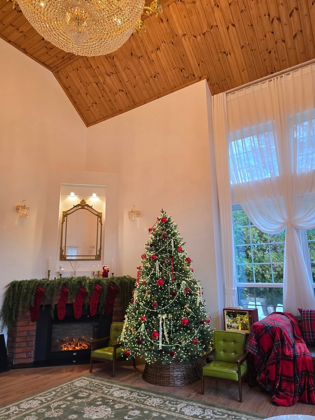 Photo shared by 안아맘 on November 01, 2025 tagging @kim_woo_joo, and @kim___teacher. May be an image of candle holder, christmas tree, Christmas stocking, lighting, chandelier, fireplace, tinsel, hearth and text.