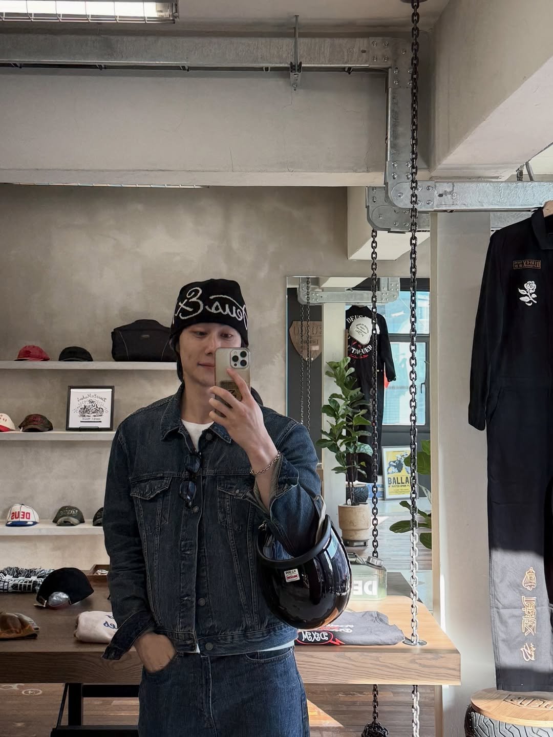 Photo by 박솔빈 on February 19, 2026. May be an image of hat, motorcycle, bandanna, outerwear, helmet and text.