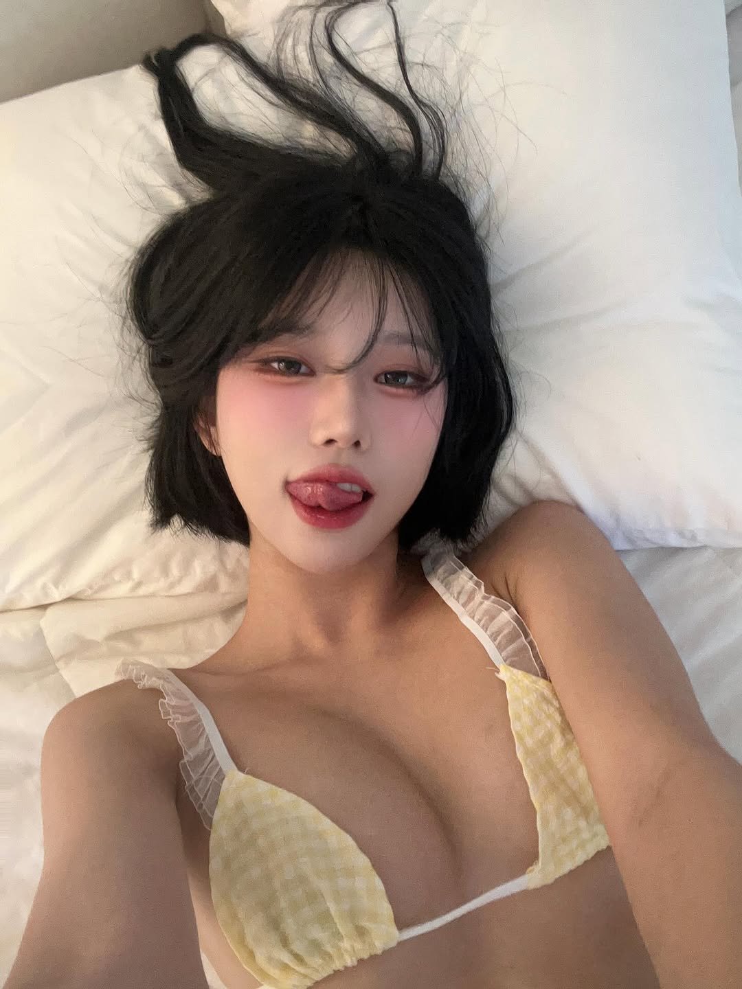 Photo by 최솜이 on October 08, 2025. May be an image of 1 person, hair, slip, bra and text.