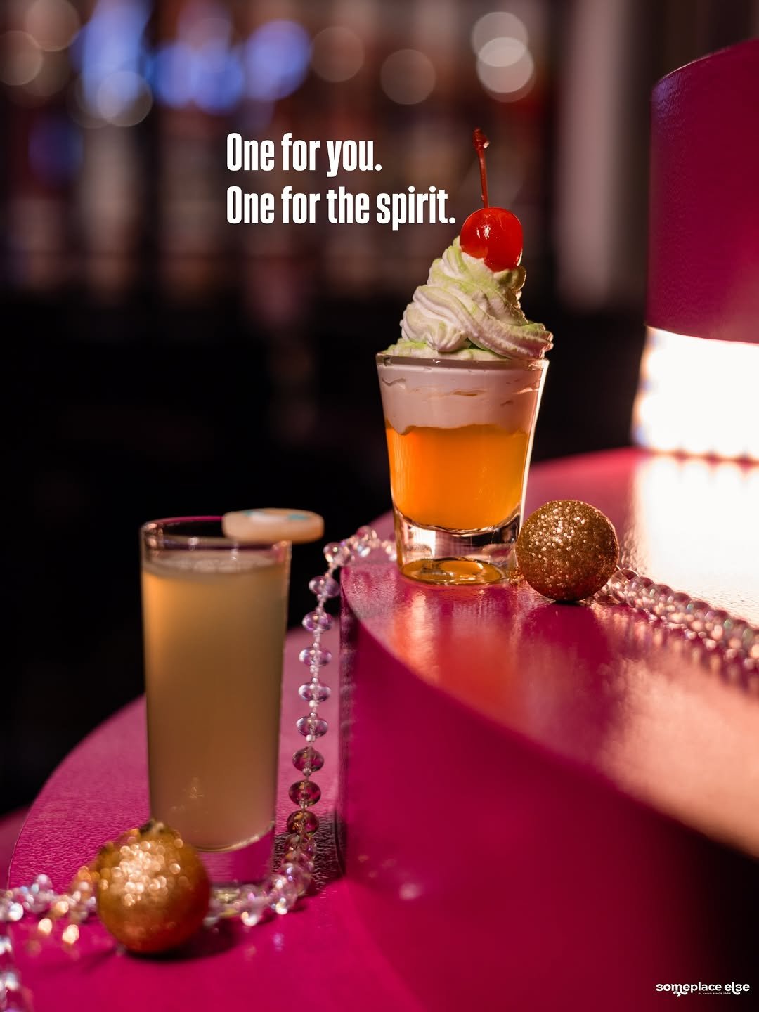 Photo by Someplace Else, Mumbai on December 30, 2025. May be an image of juice, shot glass and text that says 'One for you. One for the spirit. someplace someplacee(se ြော'.