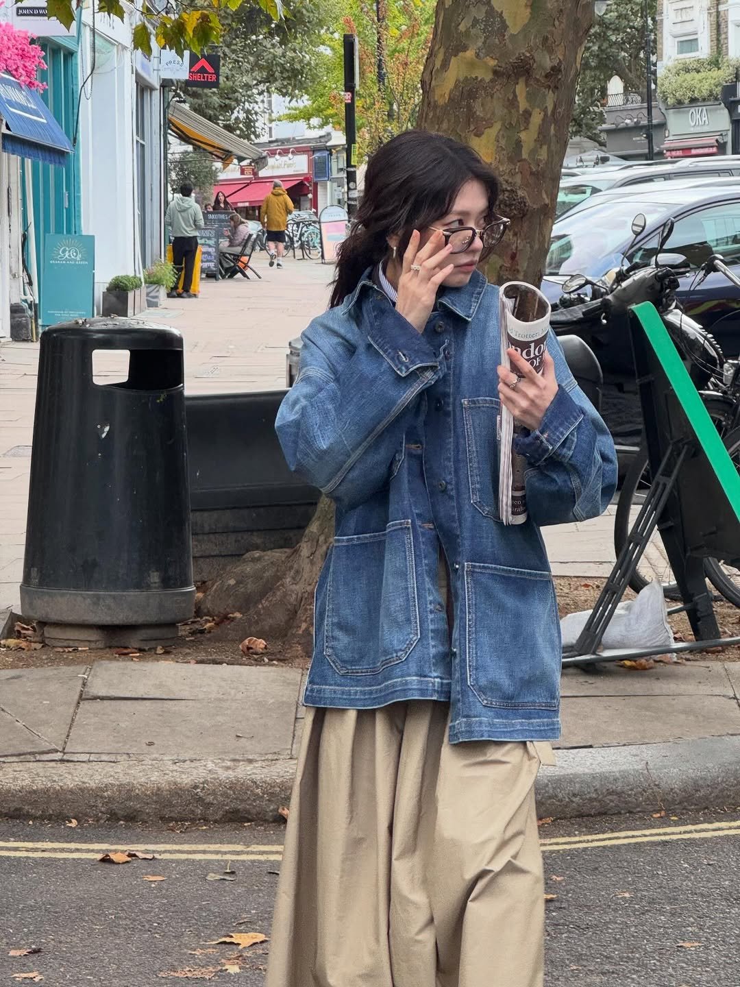 Photo by 정소민 on November 22, 2025. May be an image of duffle coat, overcoat, parka, cornflower, street and text.