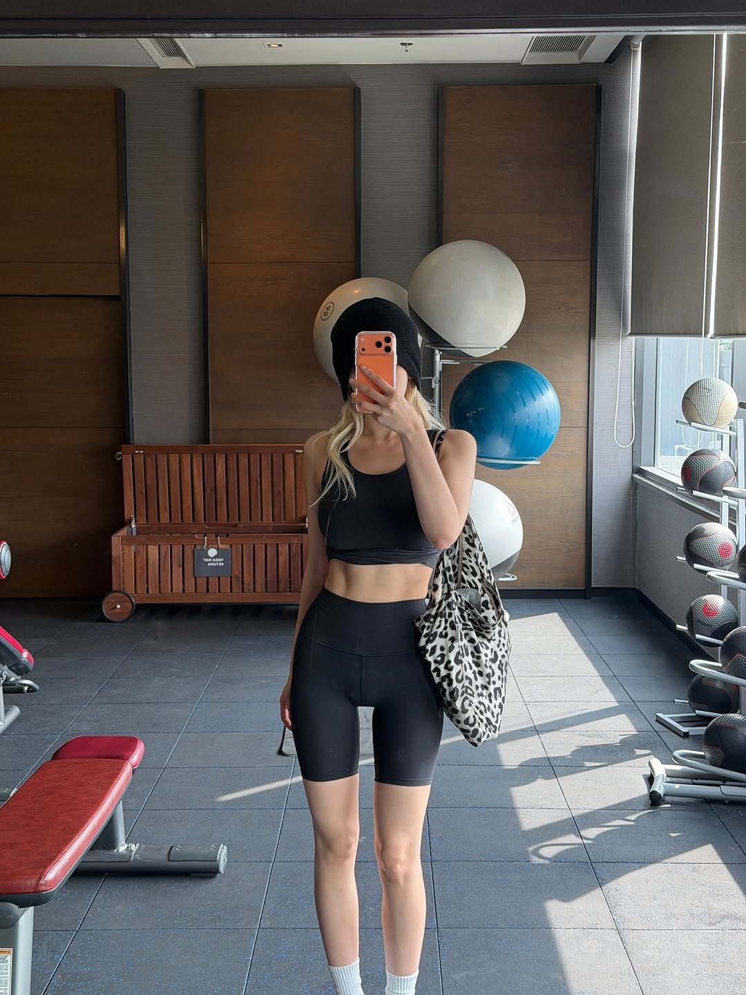 Photo by SOMI on November 19, 2025. May be an image of activewear, sweatpants, shorts, sportswear and text.