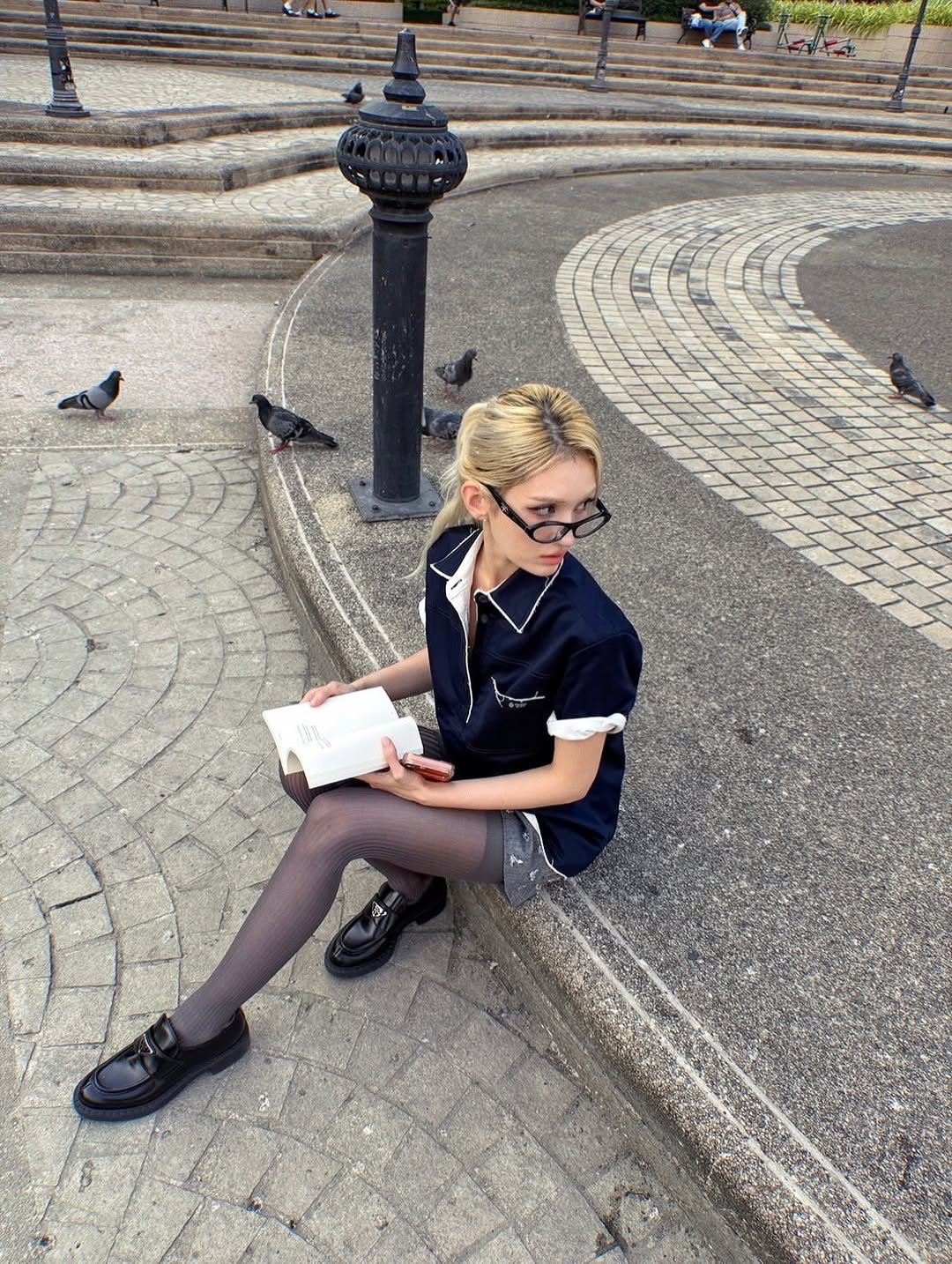 Photo shared by SOMI on December 01, 2025 tagging @prada. May be an image of text.