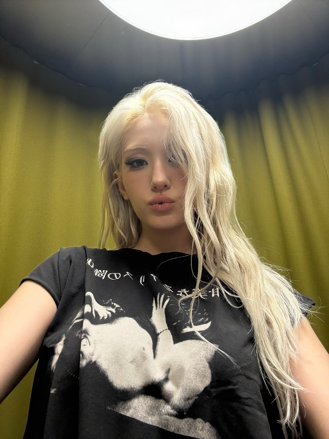 Photo shared by SOMI on October 05, 2025 tagging @theblacklabel. May be an image of 1 person, blonde hair and text.