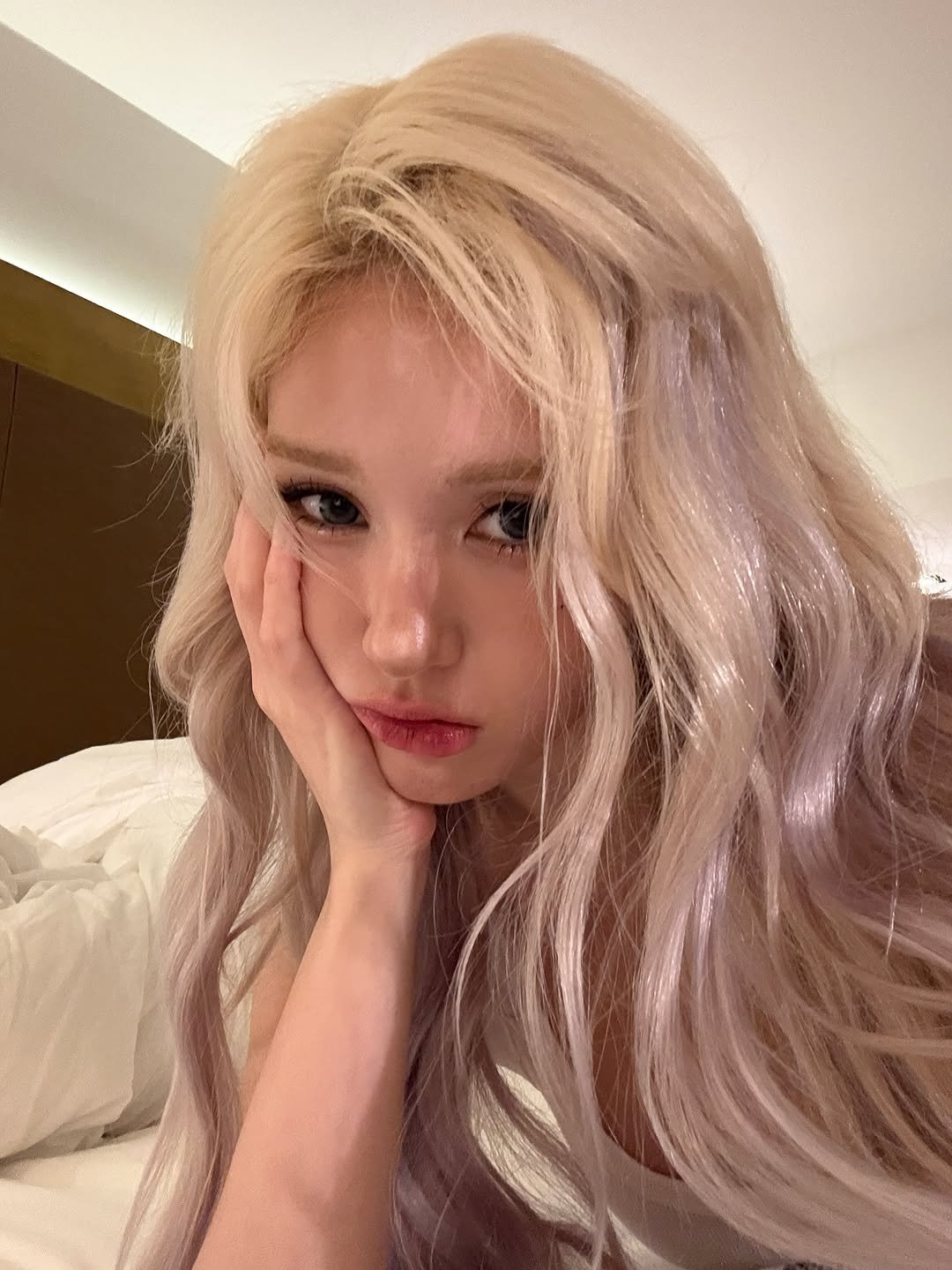 Photo by SOMI on November 02, 2025. May be an image of one or more people, blonde hair, makeup and text.