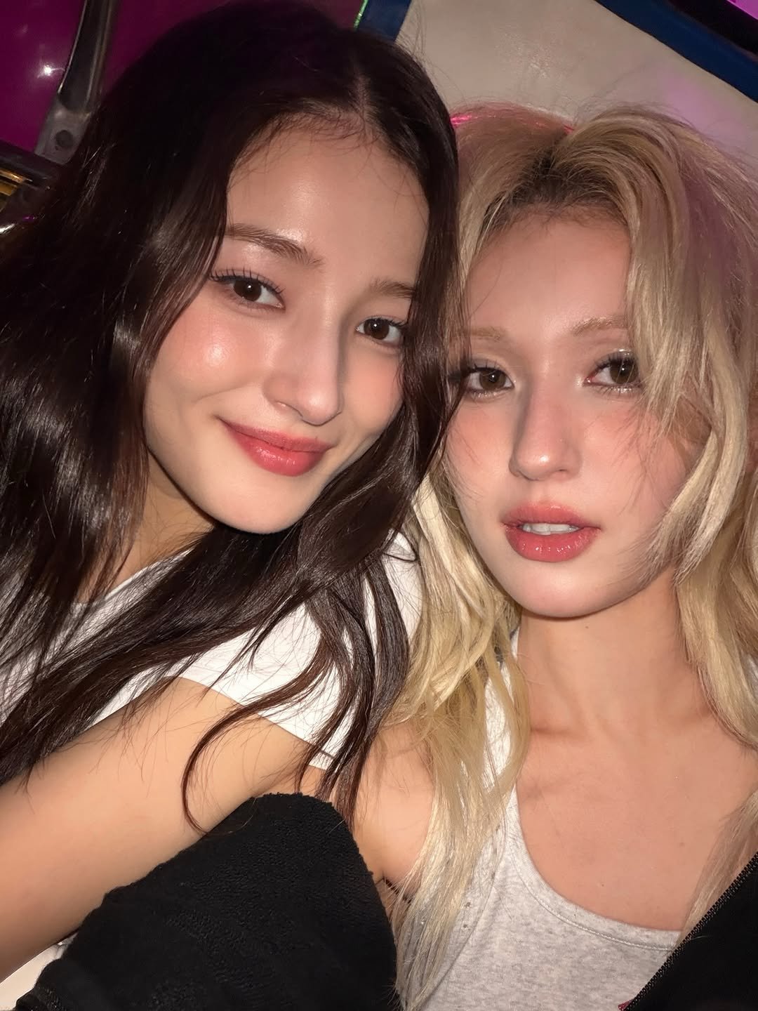 Photo shared by SOMI on December 11, 2025 tagging @somsomi0309, and @nancyjewel_mcdonie_. May be an image of one or more people, hair and text.