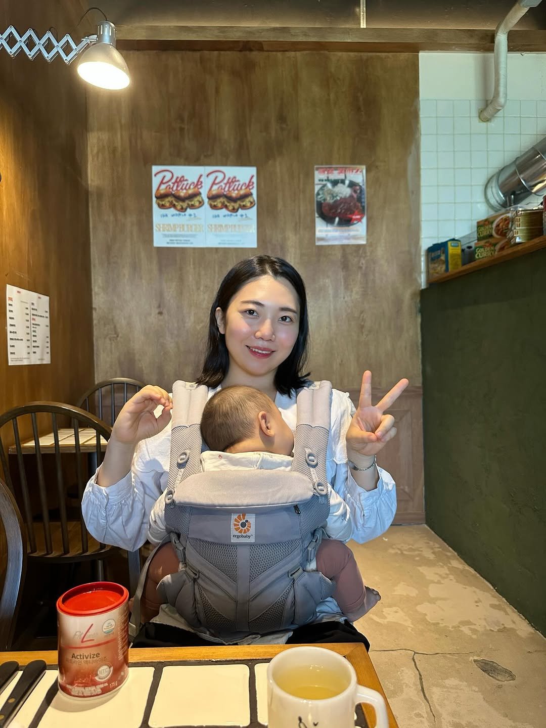Photo shared by 독일PM 🇩🇪 EVP 이소명 • 더드림그룹 👩🏻 on September 29, 2025 tagging @congbaaam_papa. May be an image of 1 person, baby, sling and text.