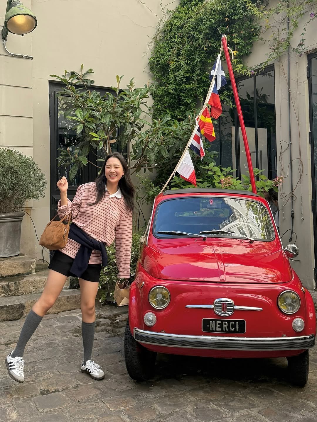 Photo by 송타민 | 팔로우하면 이뻐짐😌 on September 20, 2025. May be an image of 1 person, scooter, miniskirt and text.