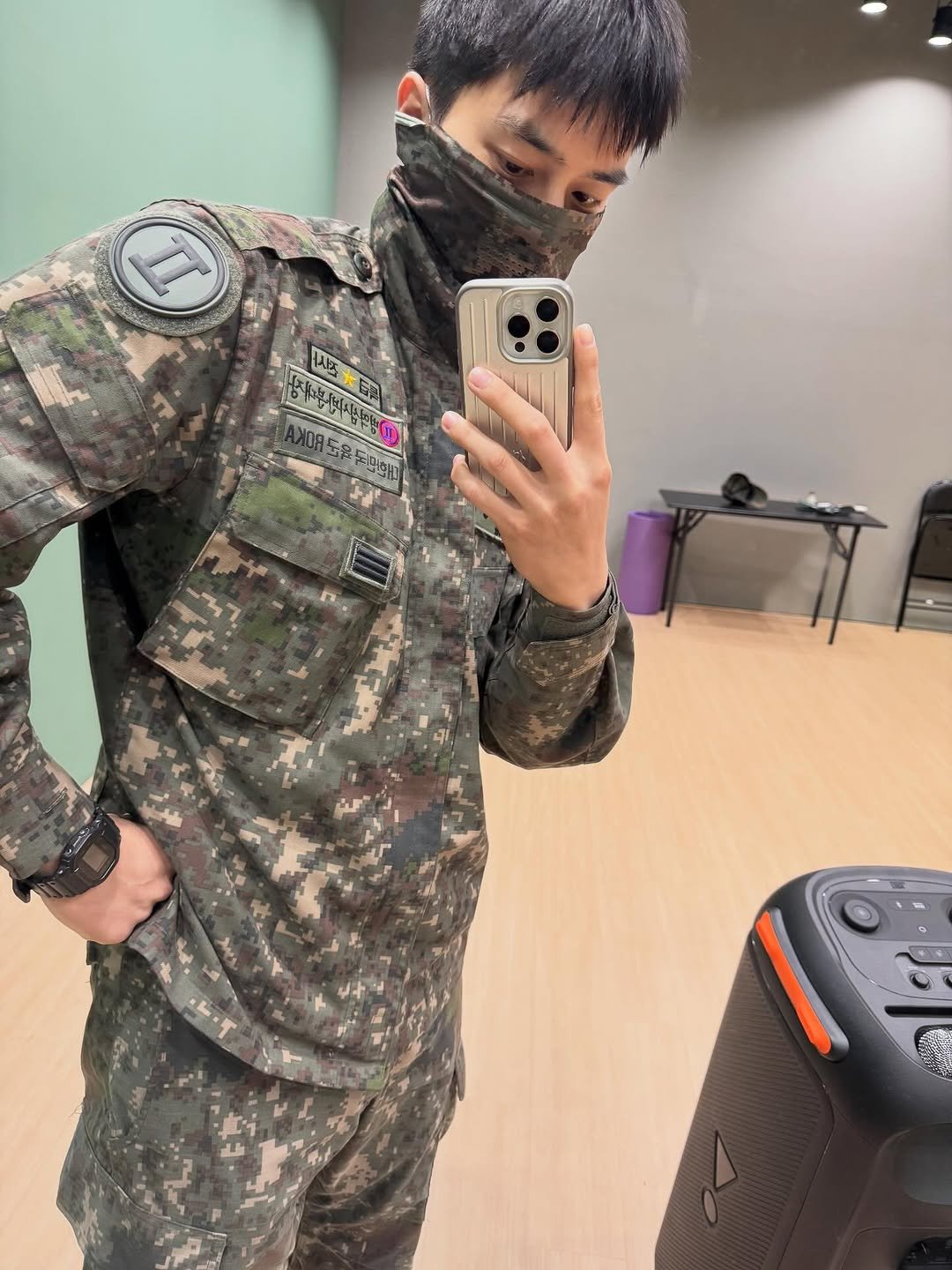 Photo by 송강 on October 01, 2025. May be an image of one or more people, bangs, military uniform, face mask and text.