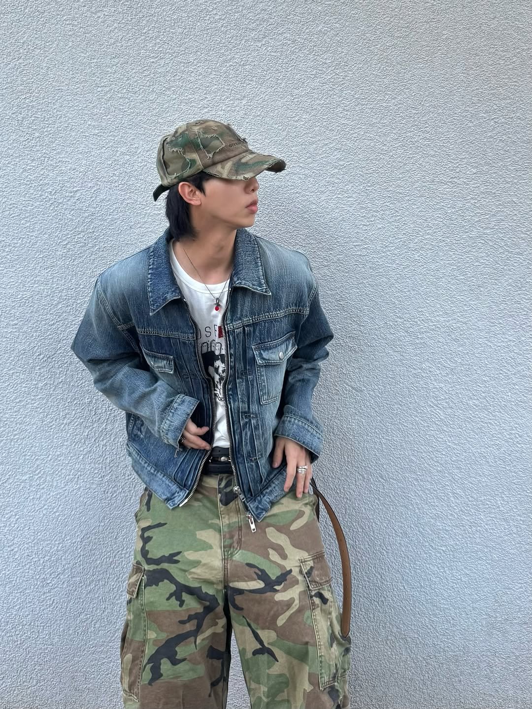 Photo shared by 소코년 sokonyun on September 02, 2025 tagging @givenchy, and @kamien.kr. May be an image of 1 person, hat, military uniform, jacket and text.