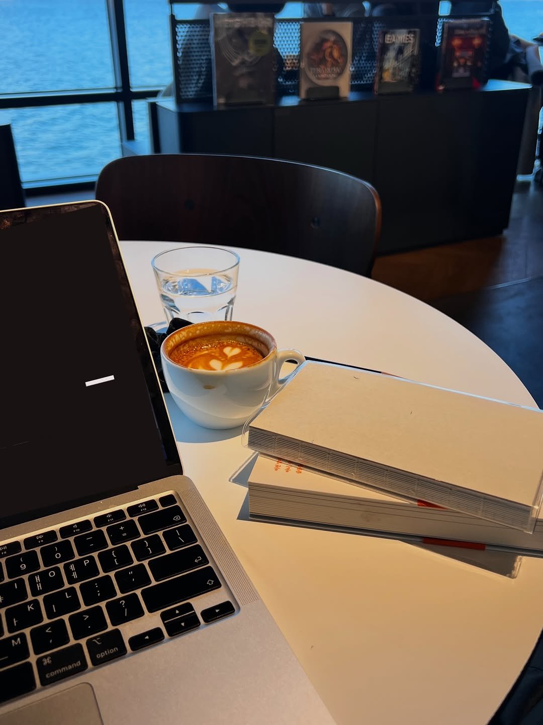 Photo by sookoh 수코 on February 02, 2026. May be an image of studying, coffee cup, book, laptop, desk, office and text.