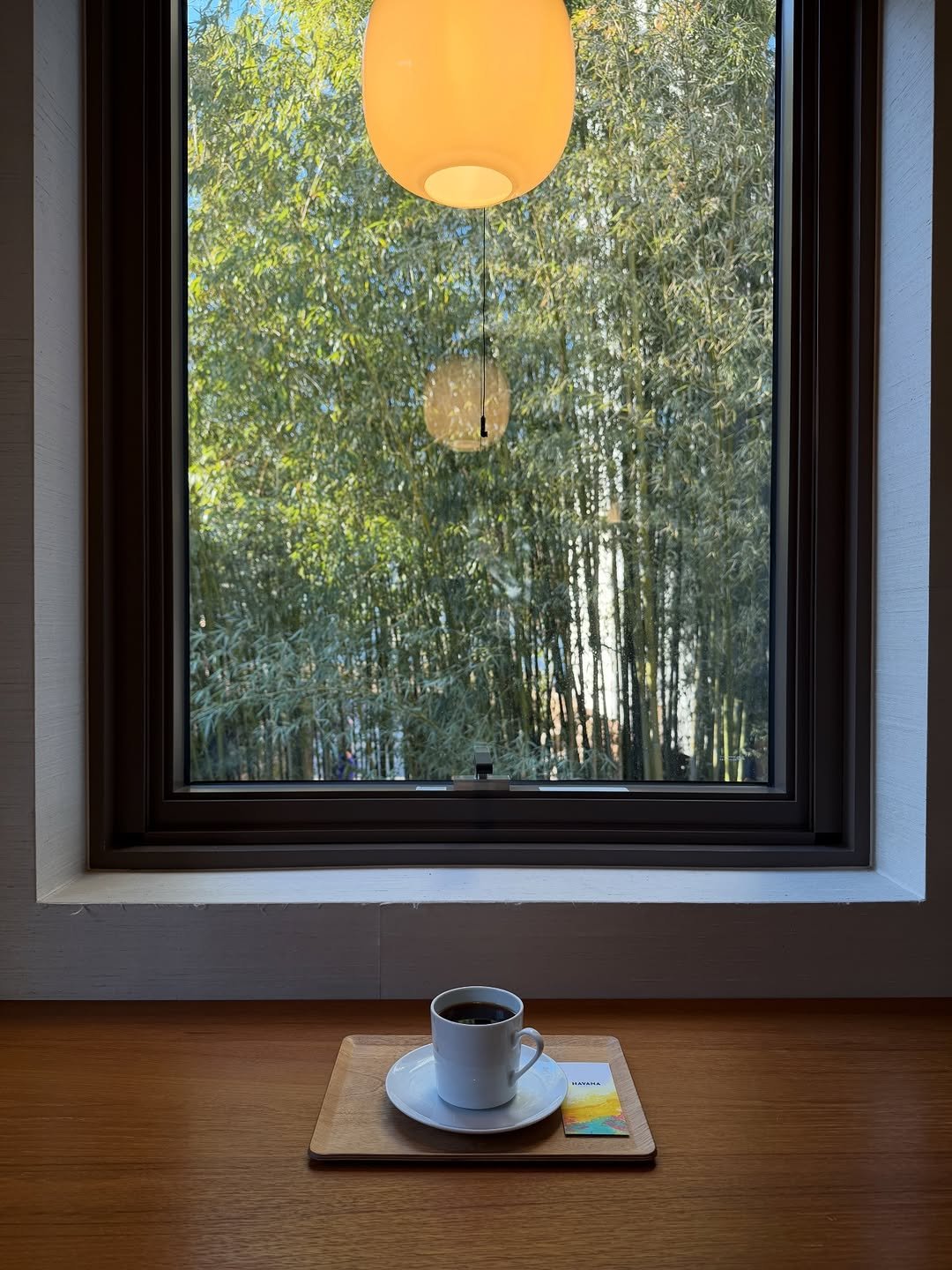 Photo by sookoh 수코 on February 18, 2026. May be an image of coffee cup, cup, tea, teacup, saucer, lamp shade and text.