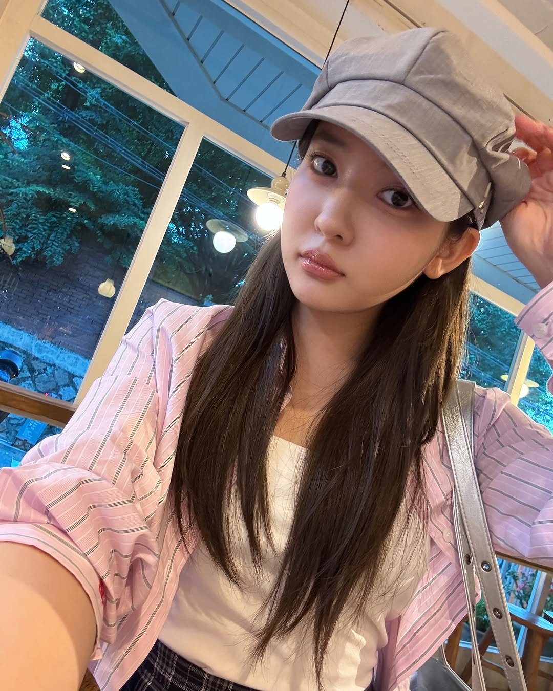 Photo by 조수민 Jo Soo Min on November 01, 2025. May be an image of one or more people, hair, hat, beret, top and text.