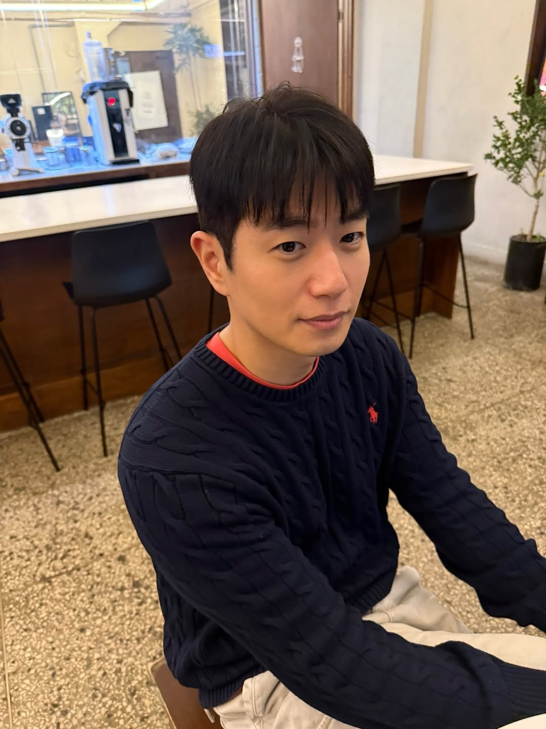 Photo by 수민 on January 29, 2026. May be an image of one or more people, hair, turtleneck, cornflower and text.