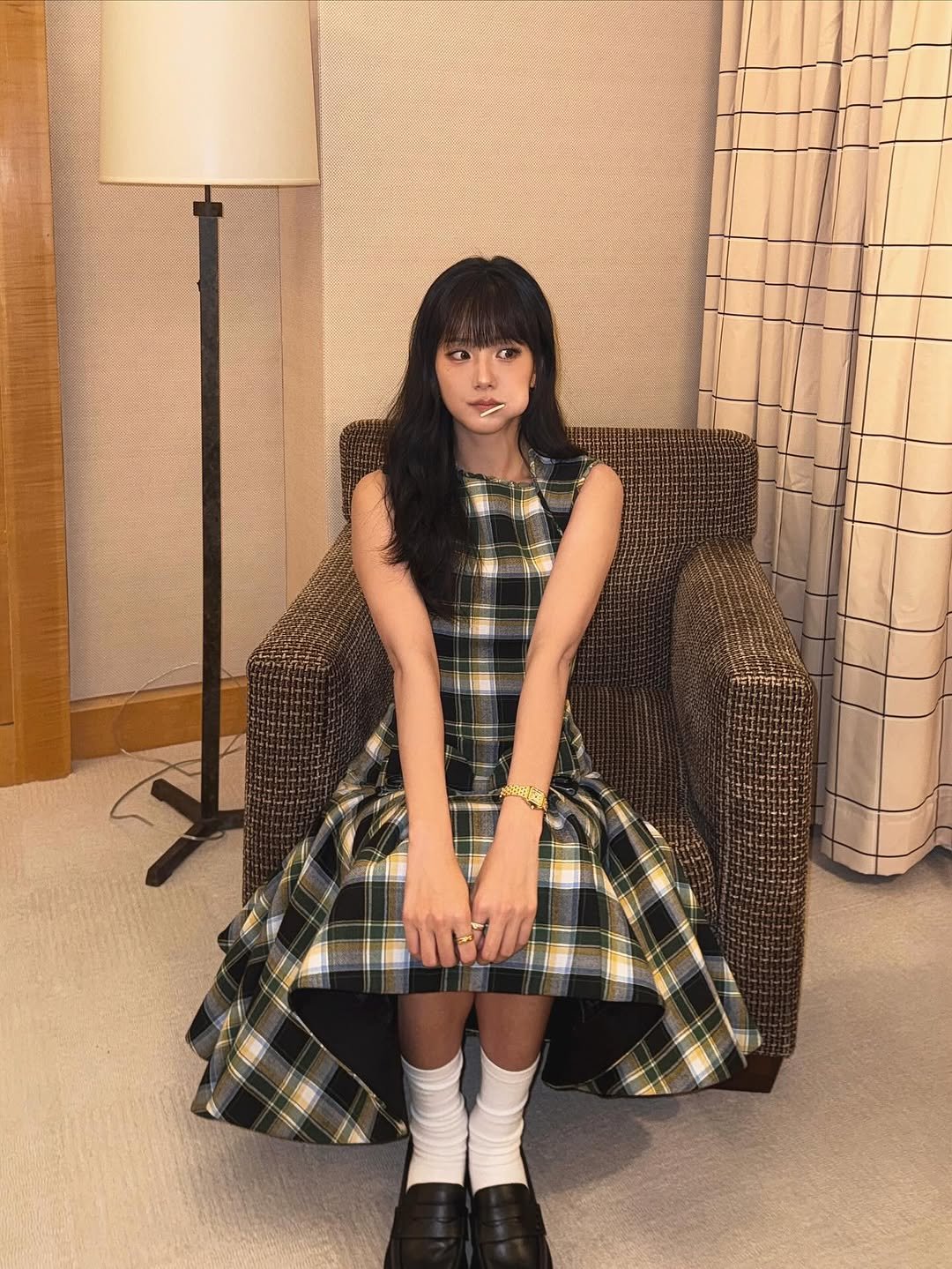 Photo by JISOO🪐 on November 06, 2025. May be an image of miniskirt, kilt and text.