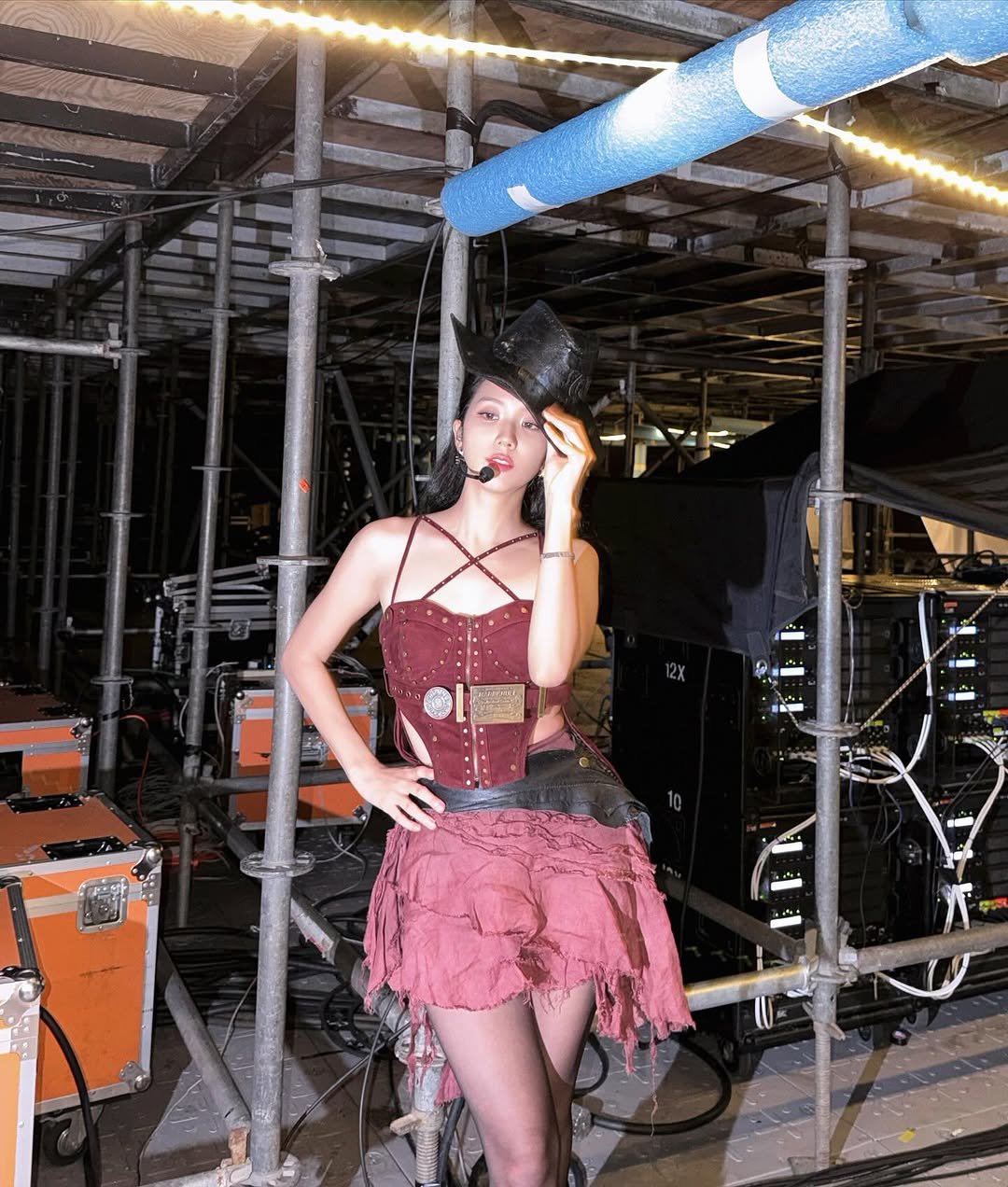 Photo by JISOO🪐 on October 22, 2025. May be an image of fishnet stockings, bowler hat and text.