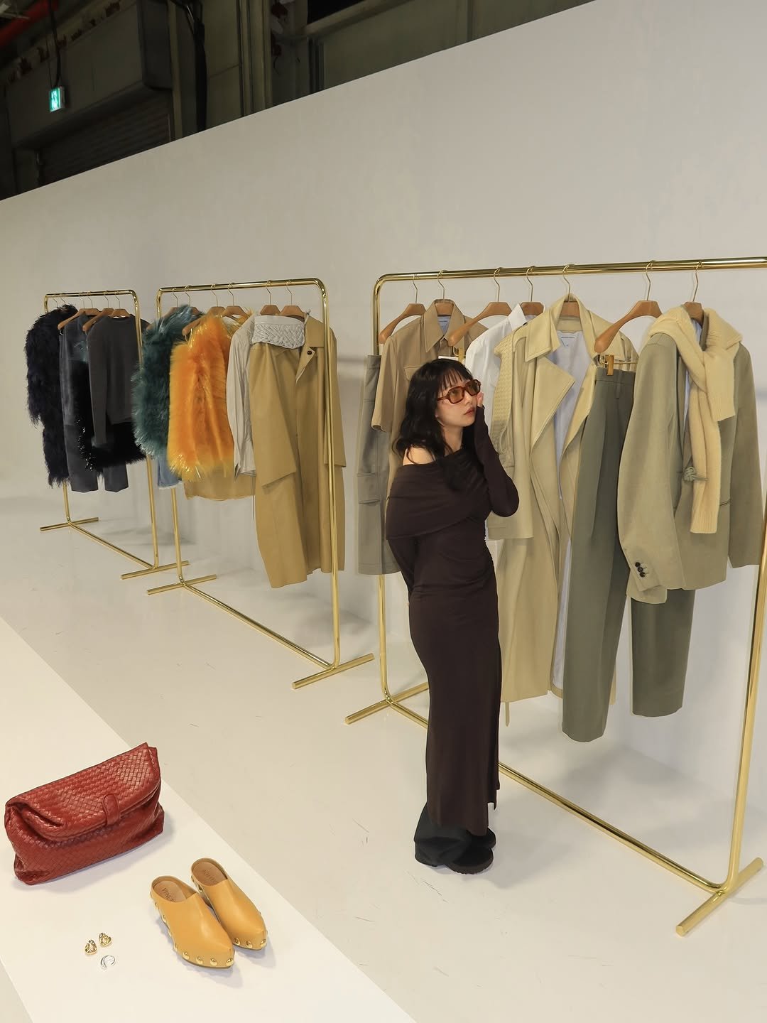 Photo shared by soso🫧 Kim dayoung on January 28, 2026 tagging @louise_trotter_. May be an image of overcoat, suit, rack, clothes hanger and text.