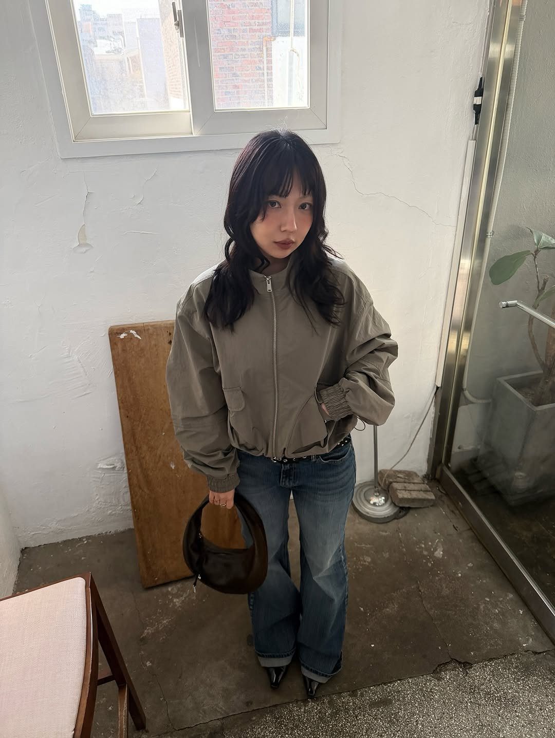 Photo shared by soso🫧 Kim dayoung on February 18, 2026 tagging @vanrohe.official. May be an image of duffle coat, top, parka, turtleneck, cornflower and text.