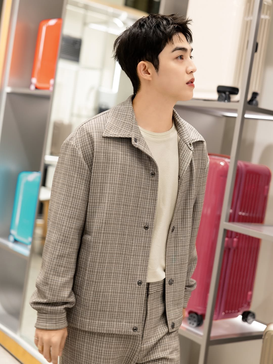 Photo shared by COUPS on September 27, 2025 tagging @rimowa. May be an image of 1 person and overcoat.
