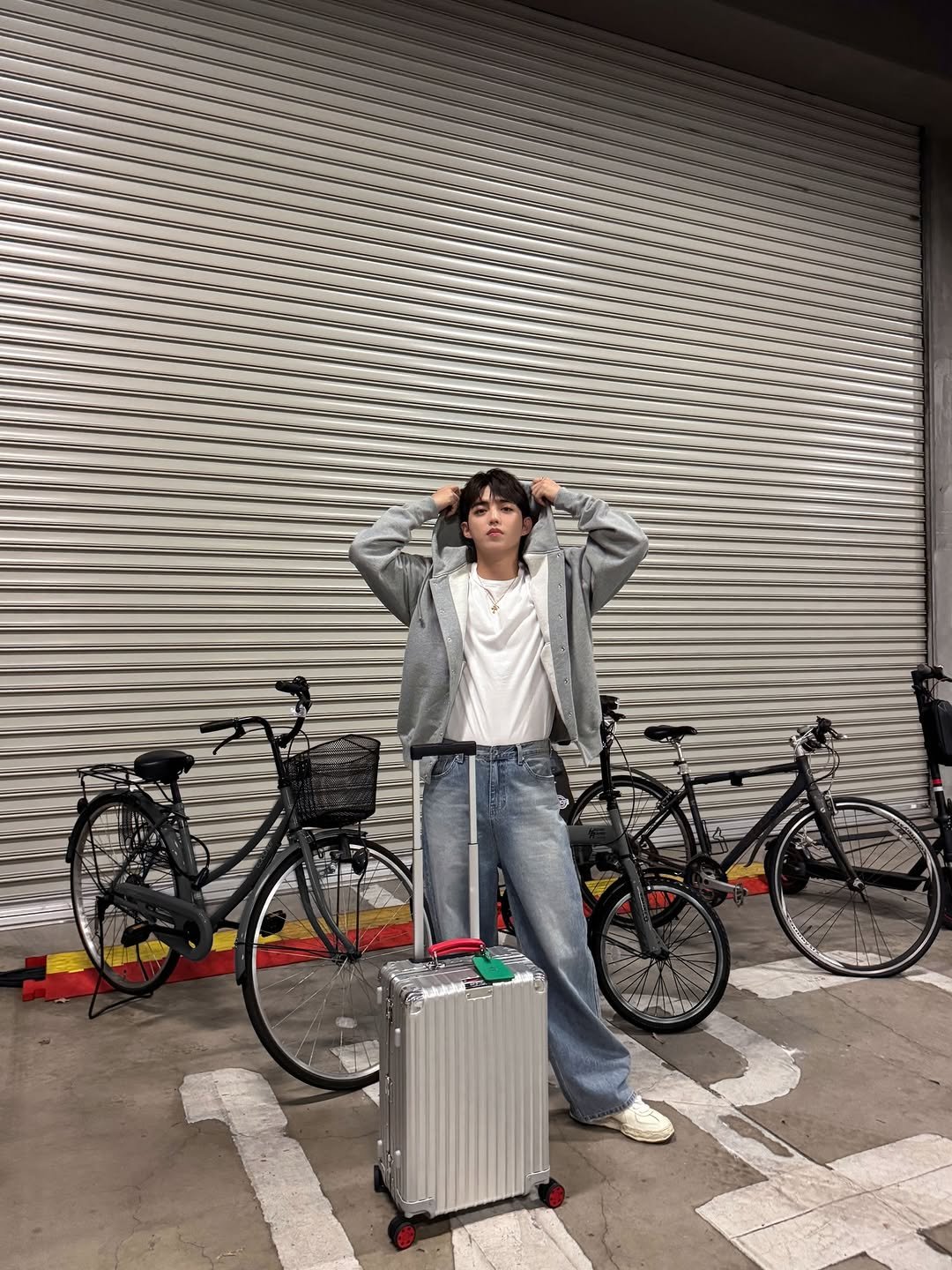 Photo shared by COUPS on December 15, 2025 tagging @rimowa. May be an image of duffle coat, suitcase, tool bag, bicycle, briefcase, luggage and text.