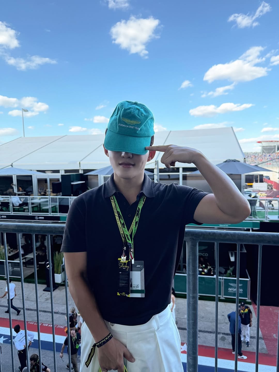 Photo shared by COUPS on October 18, 2025 tagging @boss, and @astonmartinf1. May be an image of hat and text.