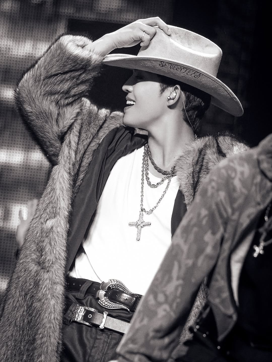 Photo shared by COUPS on October 23, 2025 tagging @boss. May be an image of one or more people, bangs, hat, bolo tie, top and concert.