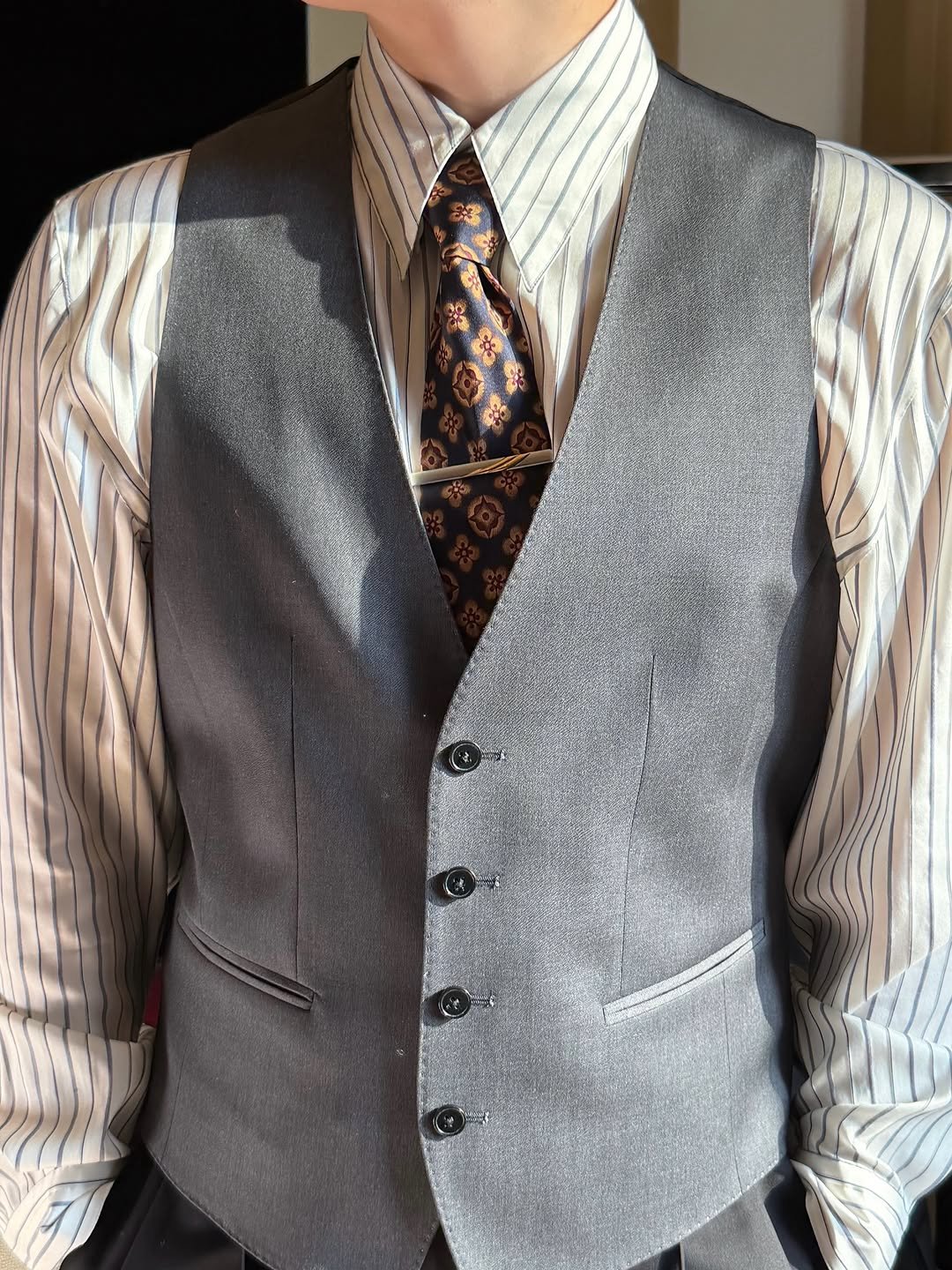 Photo shared by COUPS on February 26, 2026 tagging @boss. May be an image of suit, vest, dinner jacket and text.