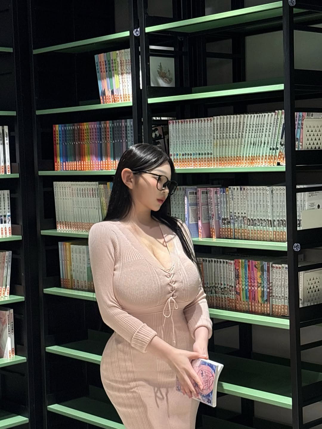 Photo by 조하윤 on April 20, 2026. May be an image of one or more people, dress, book and text.