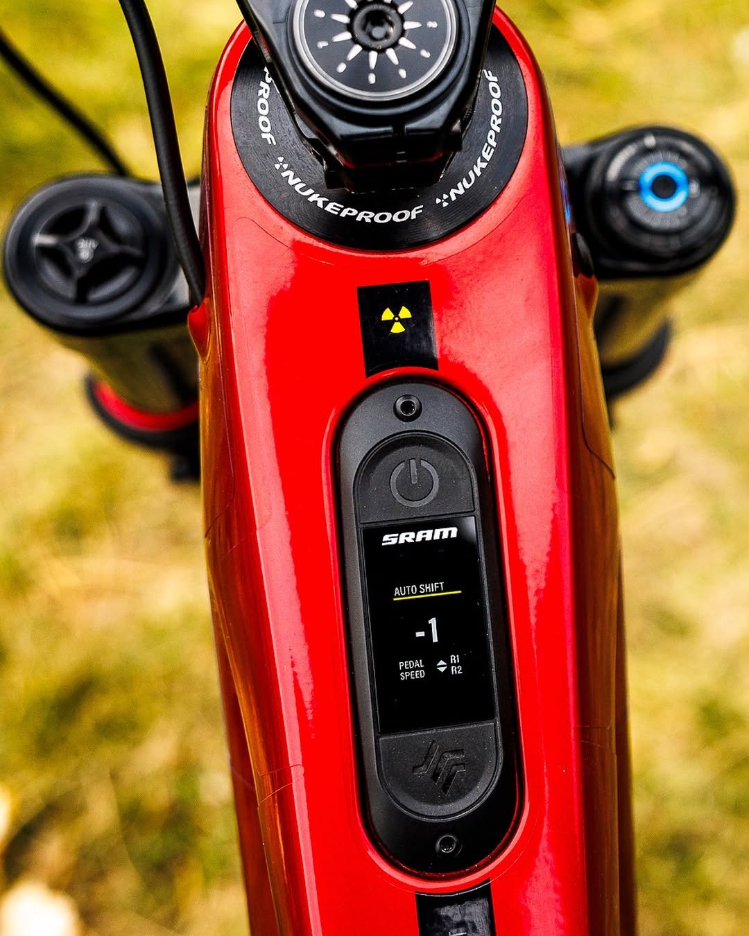 Photo shared by SRAM MTB on November 20, 2025 tagging @nukeproofbikes. May be an image of bicycle and text that says 'ROOF NUKEPROOF NUKEPROOF NUKE EPROOF SRAM AUTOSHIFT SHIFT RI R2 PEDAL SPEED'.