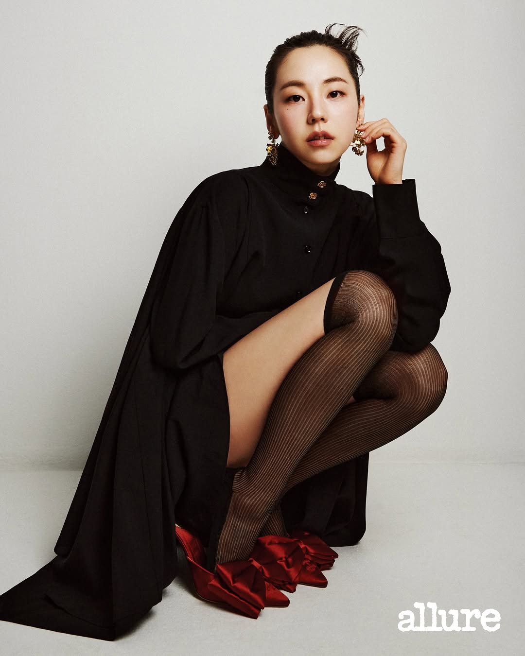Photo shared by 안소희 on January 21, 2026 tagging @hyonjin82, @gowontae, @allurekorea, @joohee_nam, and @leeyoung220. May be an image of one or more people, makeup, hair, dress, fishnet stockings, magazine, tights and text that says 'allure'.