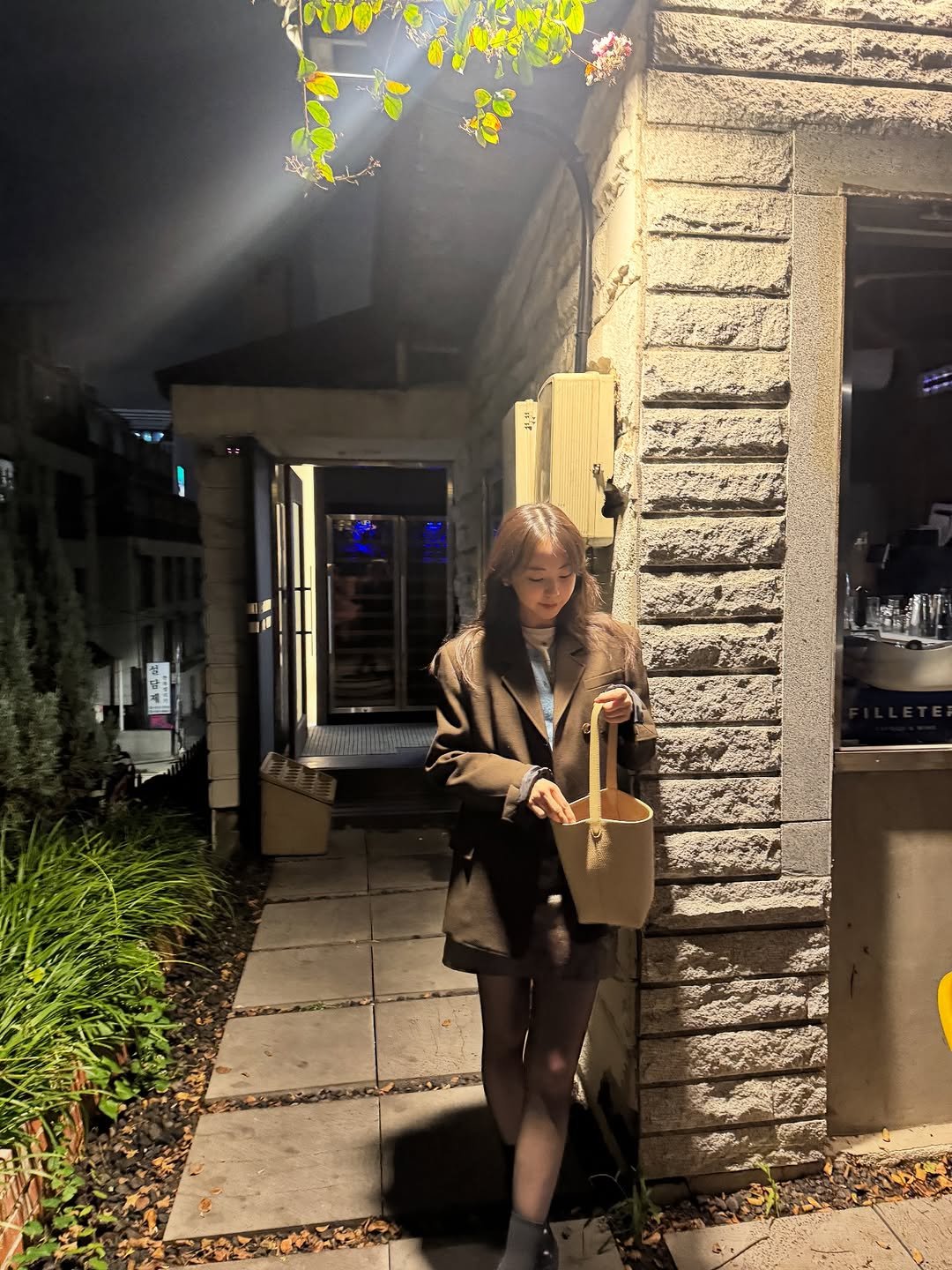 Photo shared by 안소희 on October 21, 2025 tagging @therow, and @recto_official. May be an image of text.