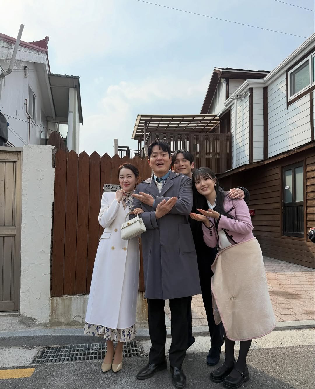 Photo by 소이현😘 on April 10, 2026. May be an image of one or more people, overcoat, duffle coat, outdoors and text.