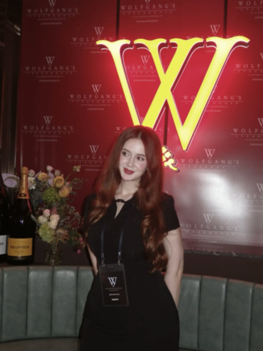 Photo shared by Sude Mutlu on August 20, 2025 tagging @exprivenow, and @expriveeats. May be an image of 1 person, hair, champagne and text that says 'W ጄ WOLEG OLEGANG'S W OLFGANGS'.