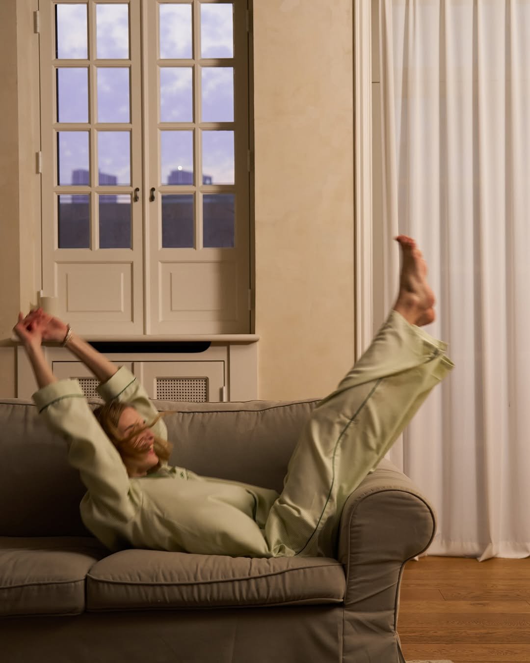 Photo by 스튜디오 쿠드 - 룩북촬영 | 영상촬영 | 제품촬영 on July 04, 2025. May be an image of 1 person, sleepwear, chaise lounge and text.