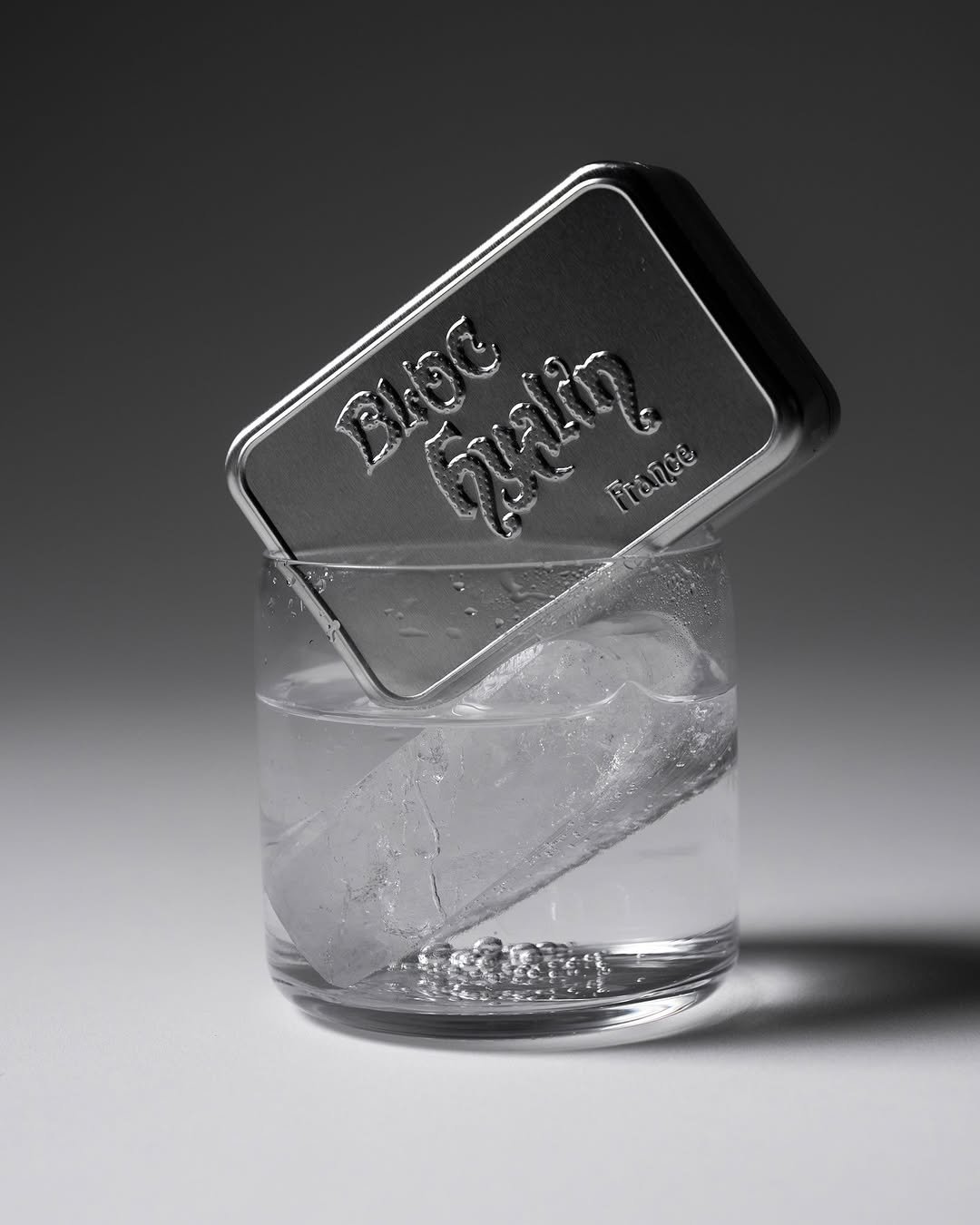 Photo by 스튜디오 쿠드 - 룩북촬영 | 영상촬영 | 제품촬영 on July 09, 2025. May be an image of lighter, cocktail shaker, flask, shot glass, paper weight, cigarette case, vodka and text.