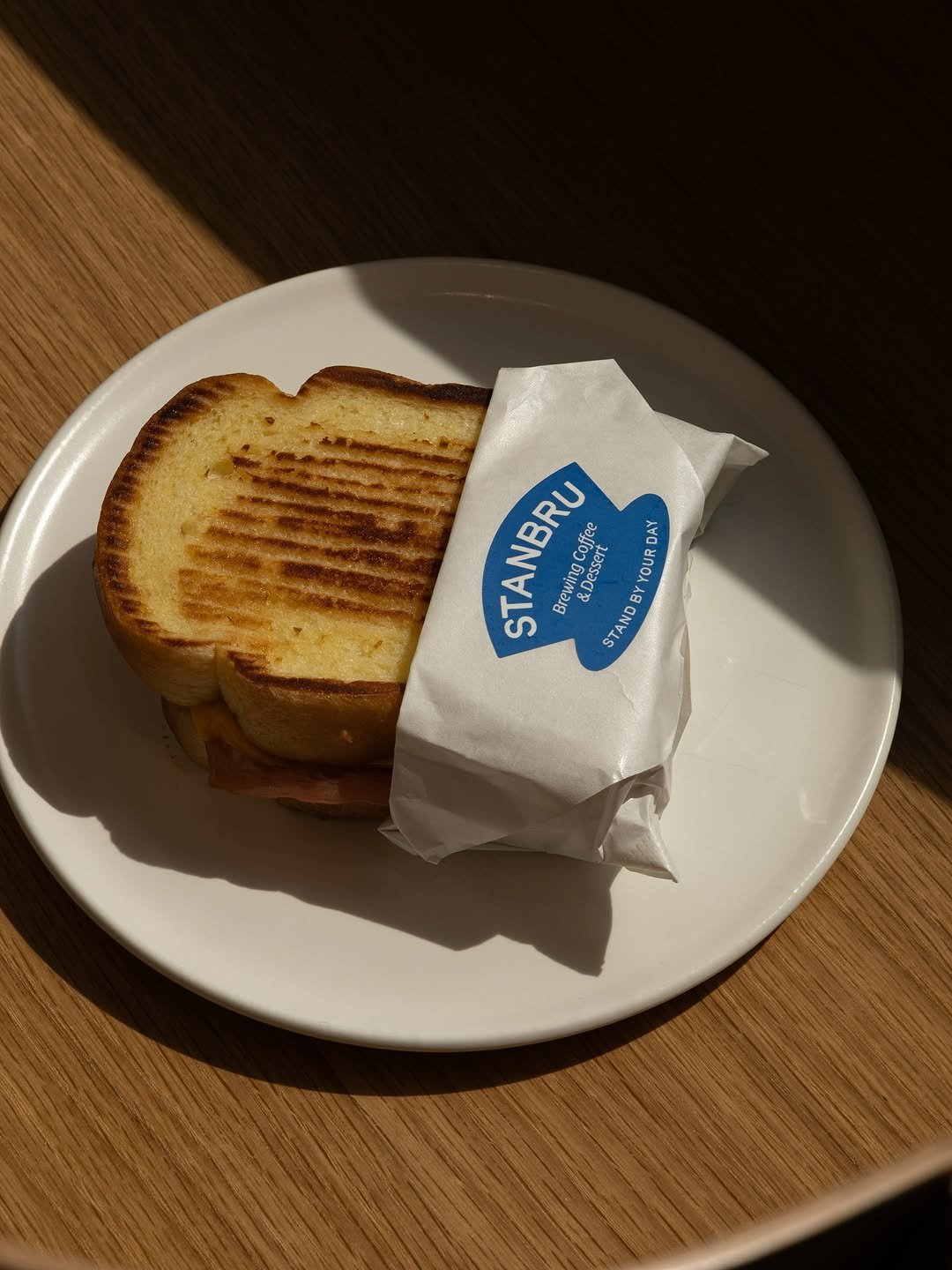 Photo shared by PULL POOL on August 04, 2025 tagging @studiopullpool. May be an image of club sandwich, toast and text that says 'STANBRU &D coffee DAY Brewing Dessert &D STANDB BY YOUR'.