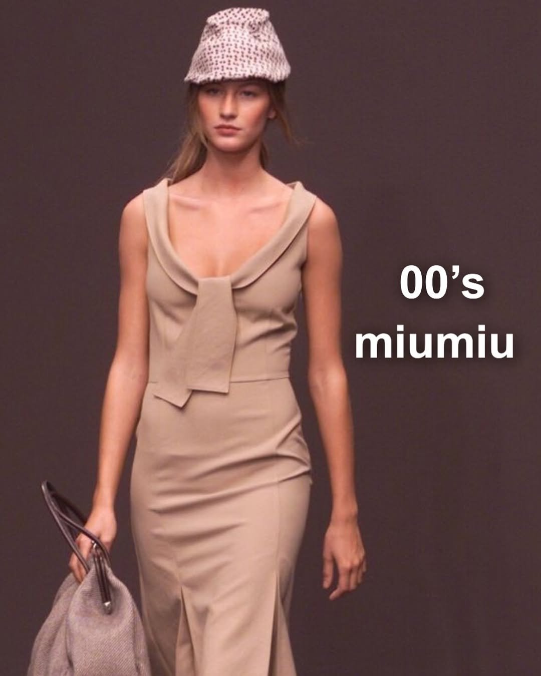 Photo by Style moabom on September 27, 2025. May be an image of 1 person, hat, dress, overskirt and text that says '00's miumiu'.