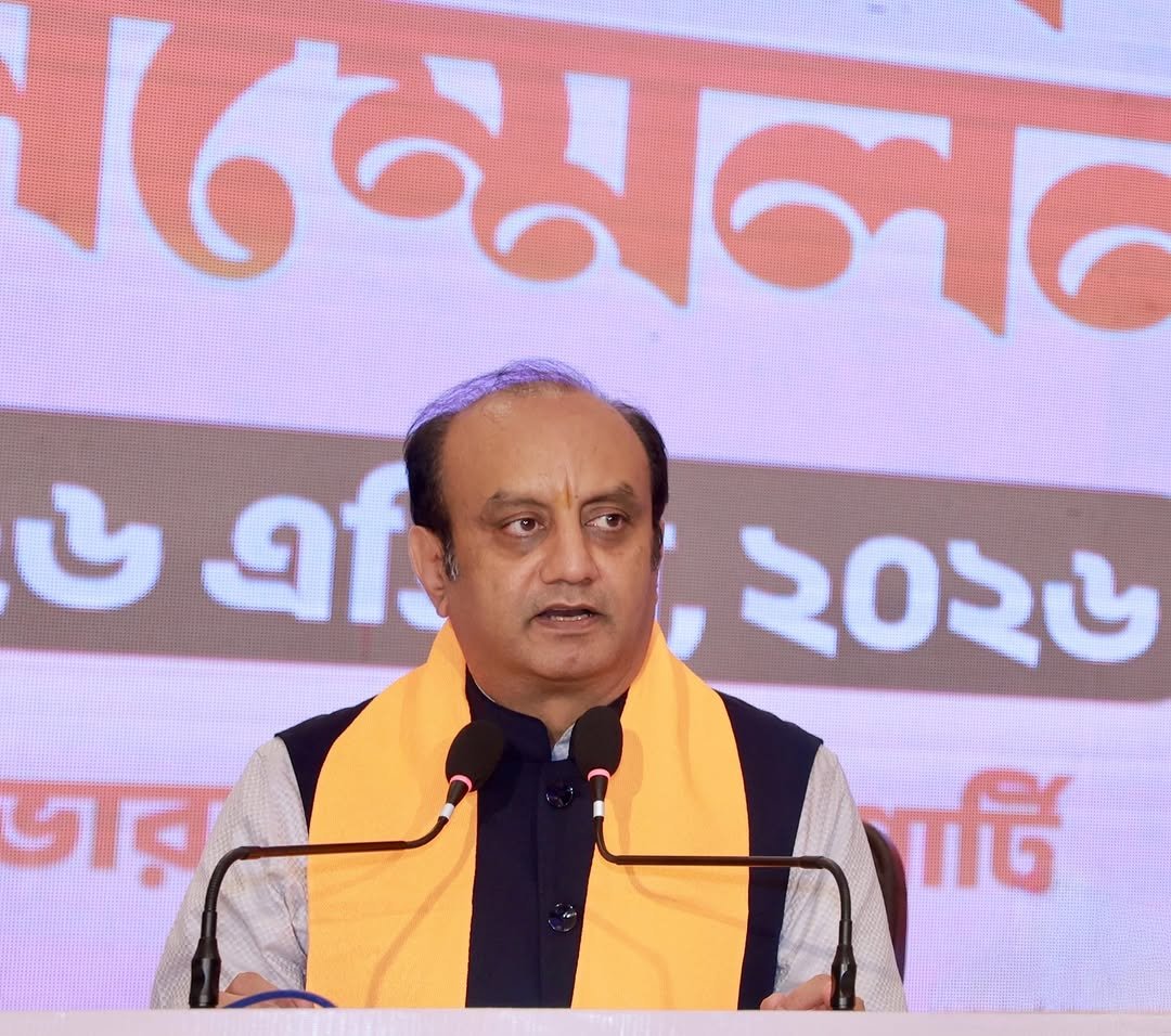 Photo by Dr Sudhanshu Trivedi on April 26, 2026. May be an image of one or more people, microphone, dais and text that says 'েমলন উত, ৬ একি ডার ২০২৬ ਾर্টি'.