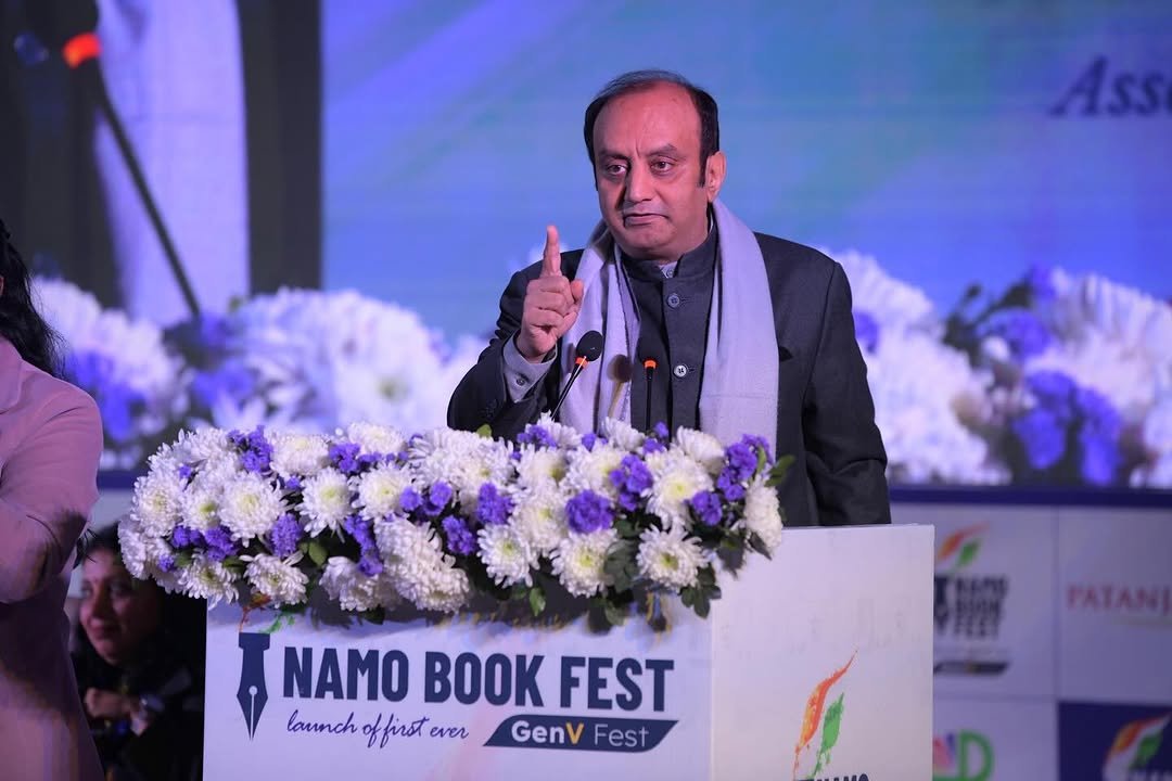 Photo by Dr Sudhanshu Trivedi on January 16, 2026. May be an image of book, dais and text that says 'NAMO BOOK FEST launch offirst ever GenV Fest'.