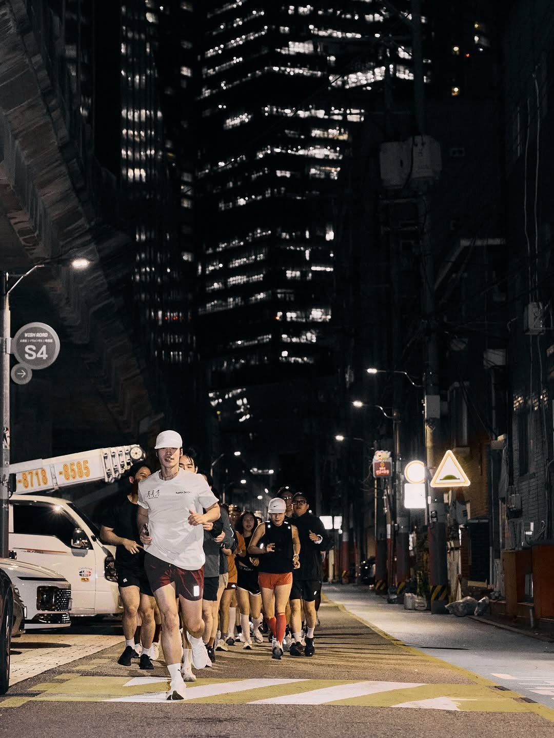 Photo by <SULTURE>  슐튀르미디어 on October 21, 2025. May be an image of one or more people, street, skyscraper, Times Square, buildings and text.