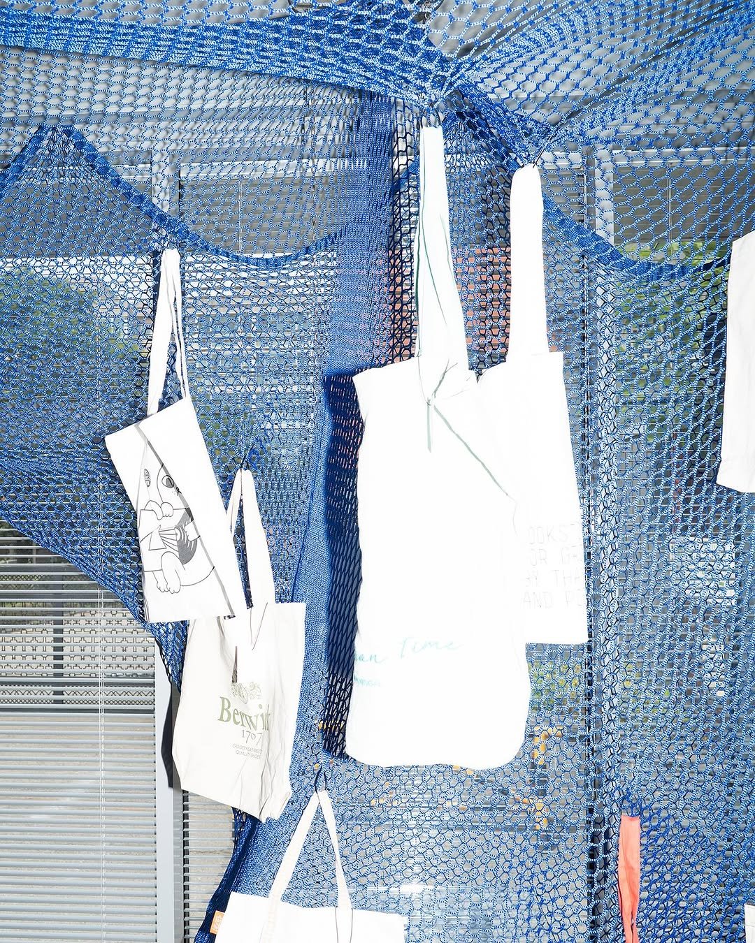 Photo shared by Hyunsun You on August 09, 2025 tagging @kaufman_kr_. May be an image of mosquito net, cage, grocery bag, clothes hanger, plastic bag, rack and text.