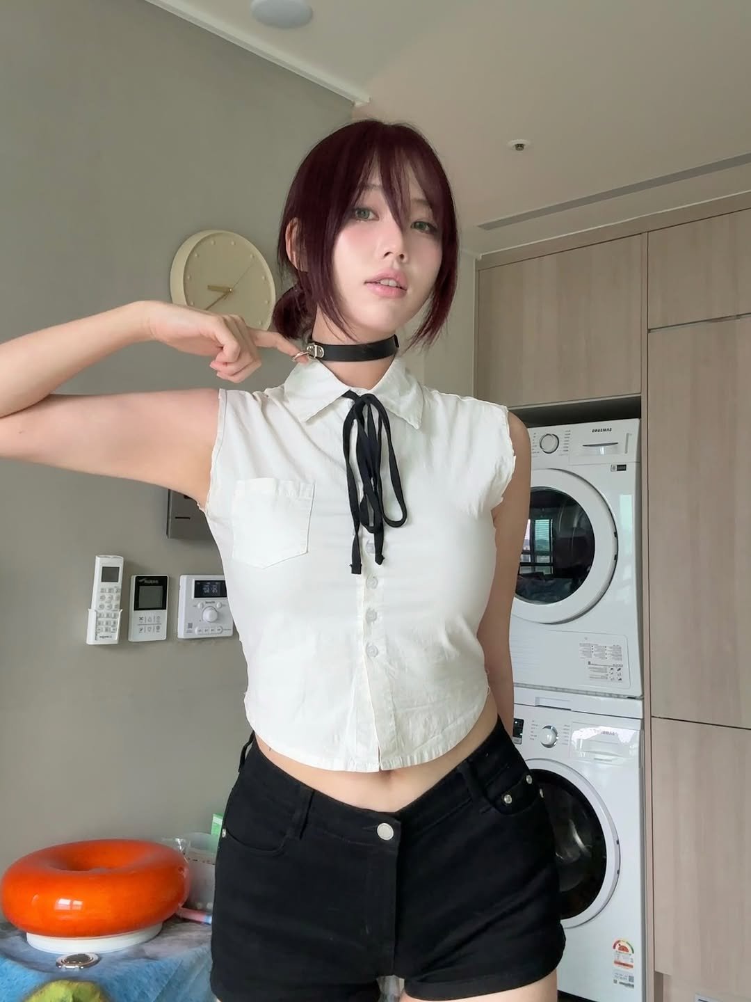 Photo by 미선짱 on October 15, 2025. May be an image of one or more people, hair, top, shorts, bolo tie, choker and miniskirt.