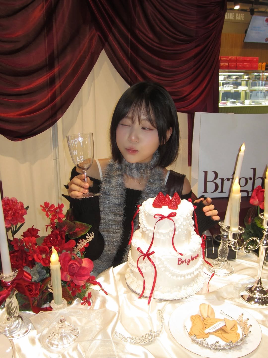 Photo by 미선짱 on January 05, 2026. May be an image of candle, cake and text that says 'BAKE BAKEGAFE GAFE Broh Br Brighrer'.