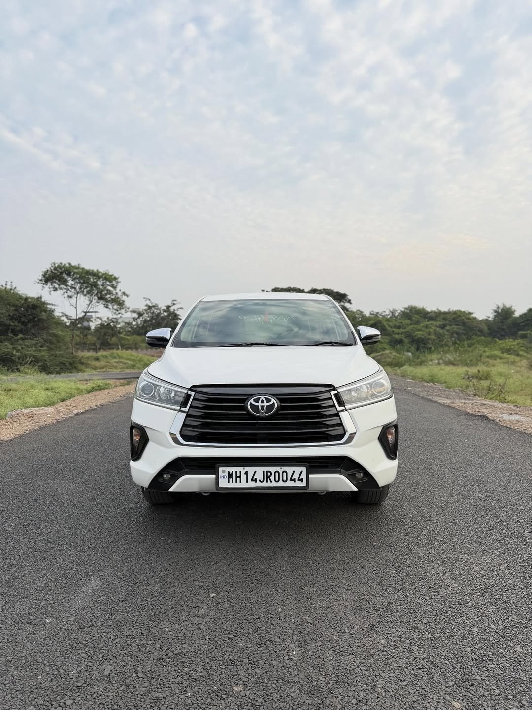 Photo by Sunny Car on February 08, 2026. May be an image of car, wheel, windshield, road and text that says '"MH HH14JR0044'.