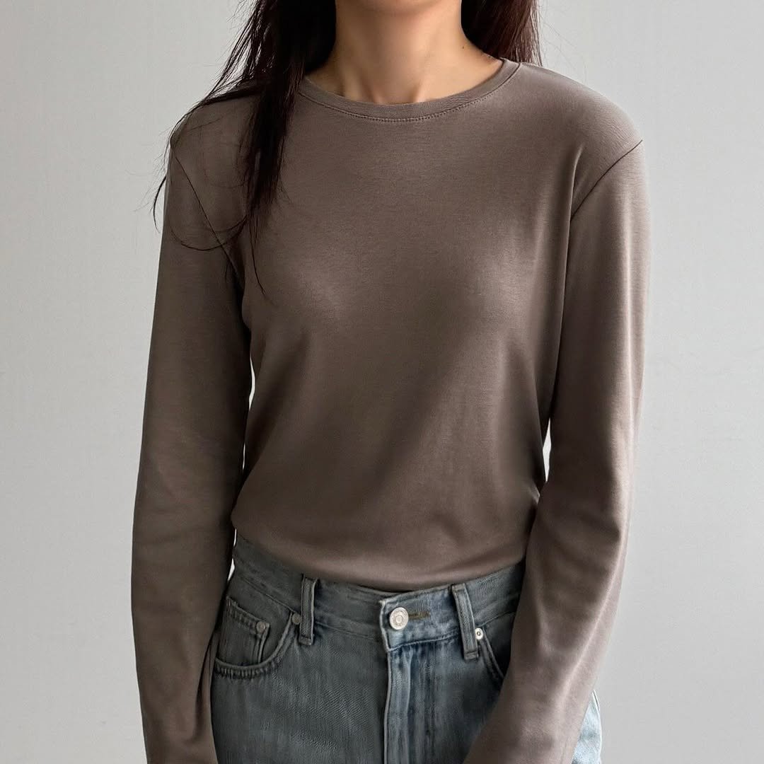 Photo by 김지선 on November 07, 2025. May be an image of top, turtleneck and text.