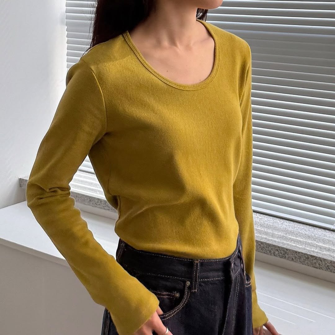 Photo by 김지선 on November 07, 2025. May be an image of top, turtleneck and text.