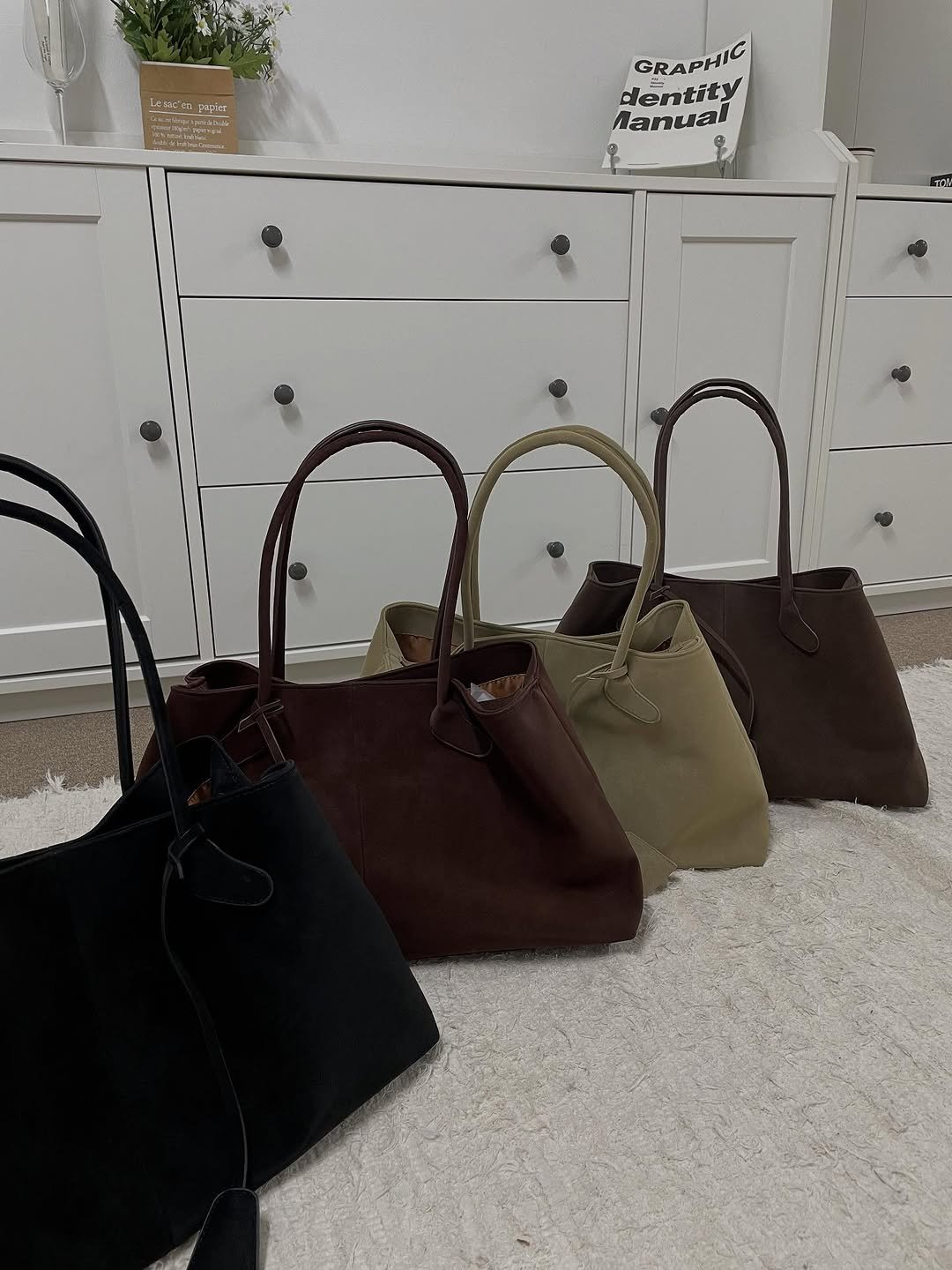 Photo by 김지선 on October 01, 2025. May be an image of briefcase, clutch, purse and text.