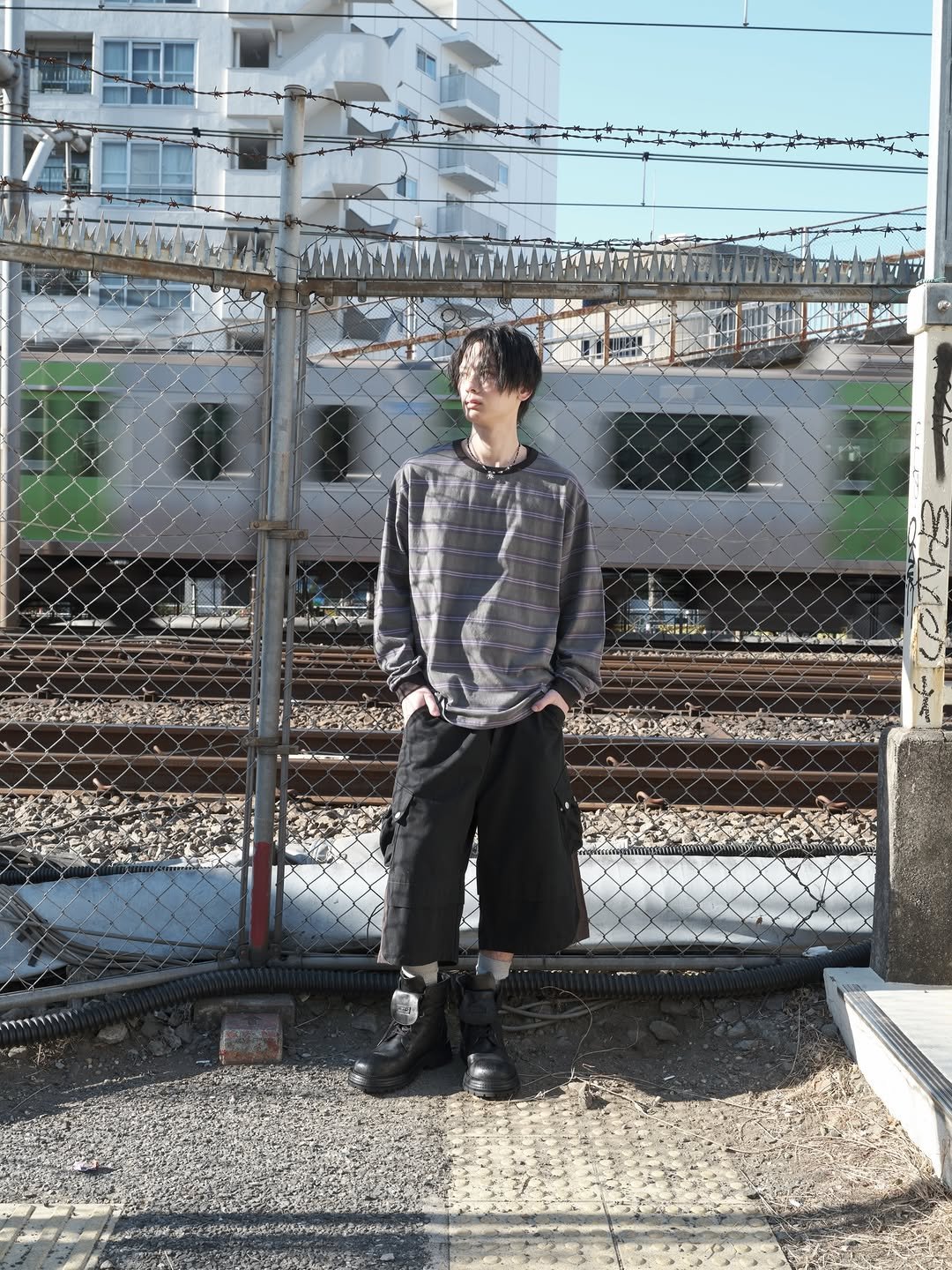 Photo by Supersub on February 12, 2026. May be an image of train, duffle coat, railroad and text.